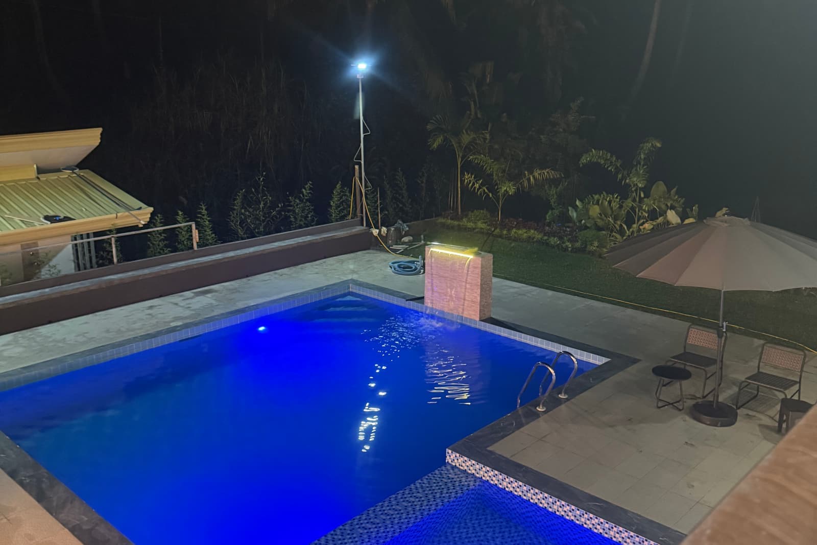 Aerial view of the illuminated swimming pool at night