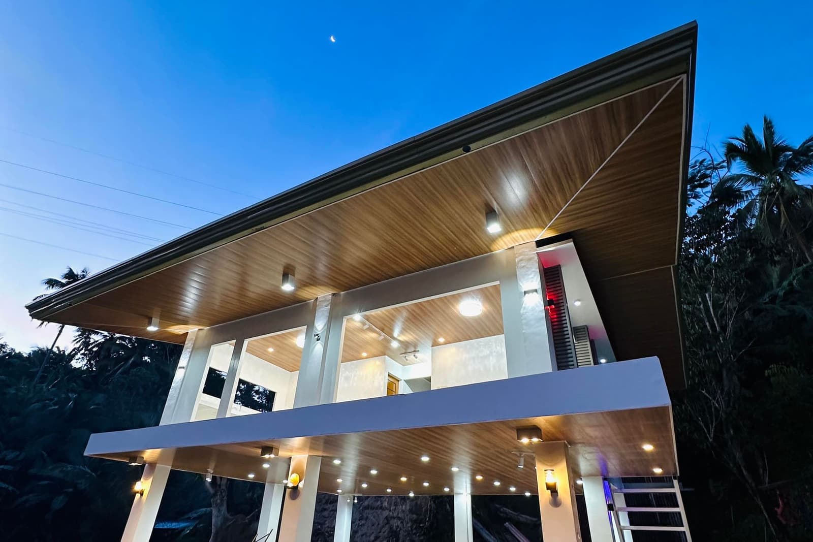 The modern farm house villa at dusk